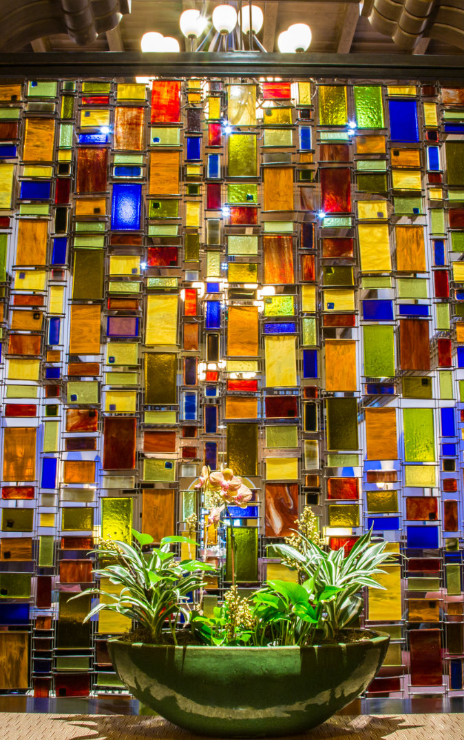 geometric stained glass wall in the hotel lobby