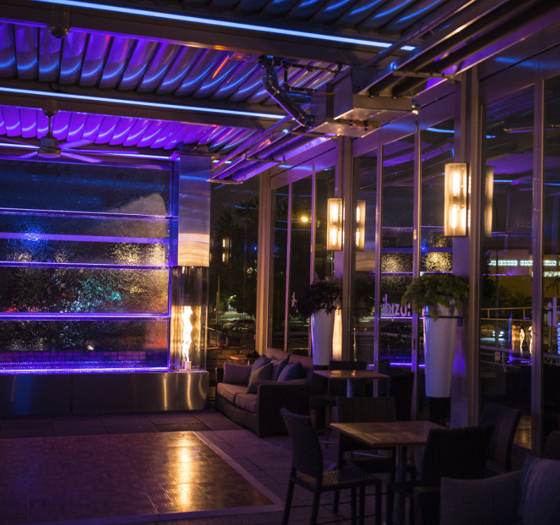 interior shot of ibiza urban lounge at night with its nighttime lights turned on